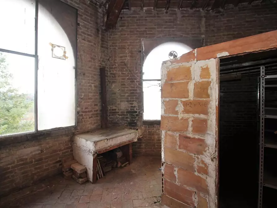 Immagine 17 di Appartamento in vendita  a Siena