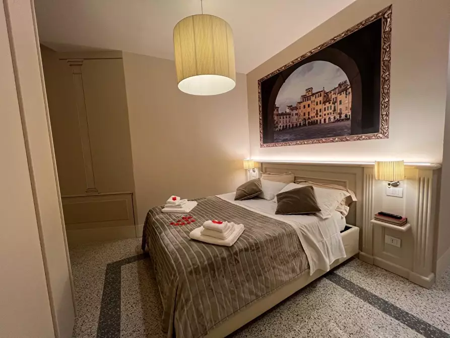 Immagine 13 di Appartamento in affitto  a Lucca