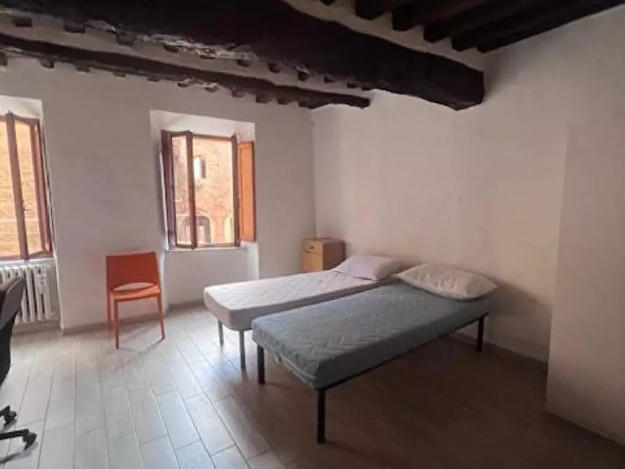Immagine 1 di Appartamento in affitto  a Siena