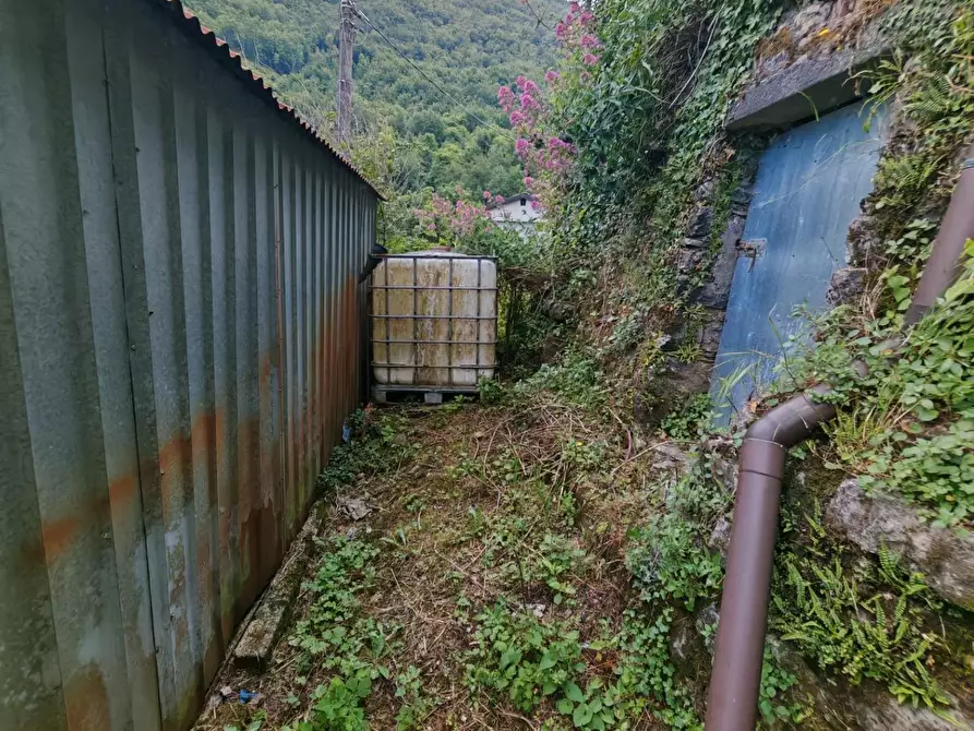 Immagine 11 di Porzione di casa in vendita  a Fivizzano