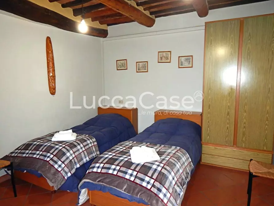 Immagine 13 di Appartamento in vendita  a Lucca