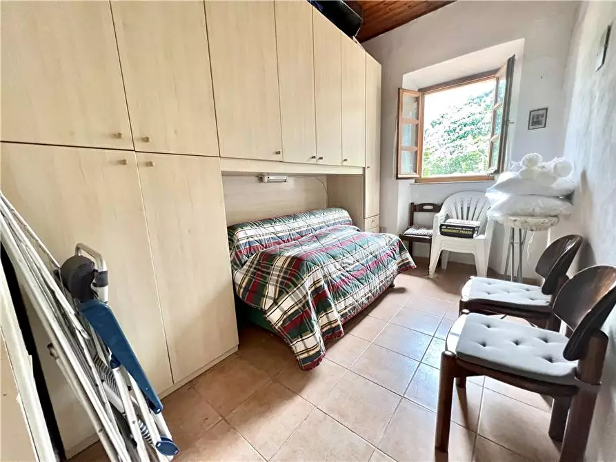 Immagine 11 di Porzione di casa in vendita  a Marciana