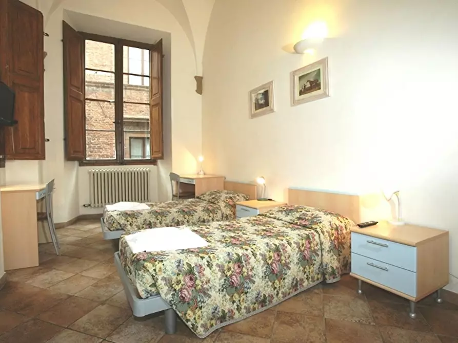 Immagine 6 di Camera condivisa in affitto  in Via del Porrione a Siena