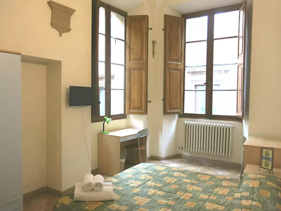 Immagine 1 di Camera condivisa in affitto  in Via del Porrione a Siena