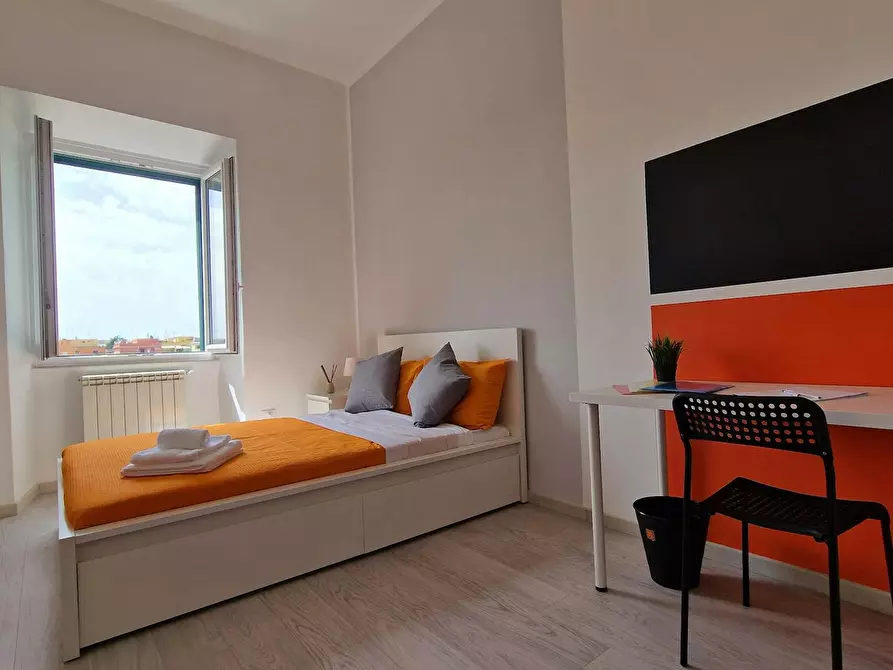 Immagine 6 di Camera in affitto  in Via Ostiense a Roma