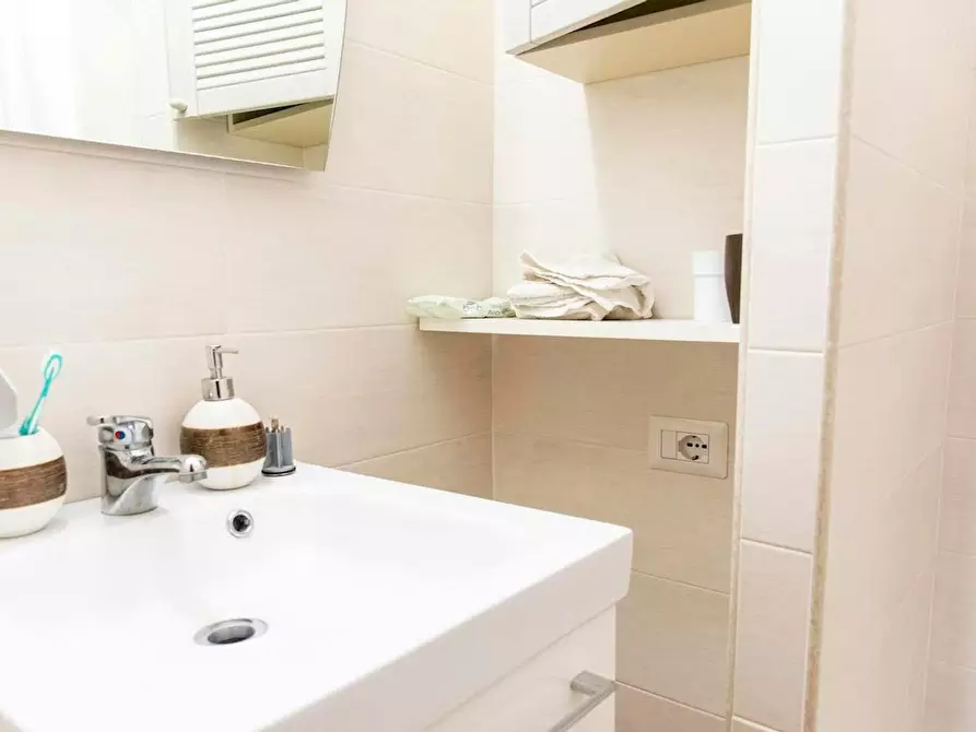 Immagine 5 di Camera in affitto  in Viale Cesare Pavese a Roma