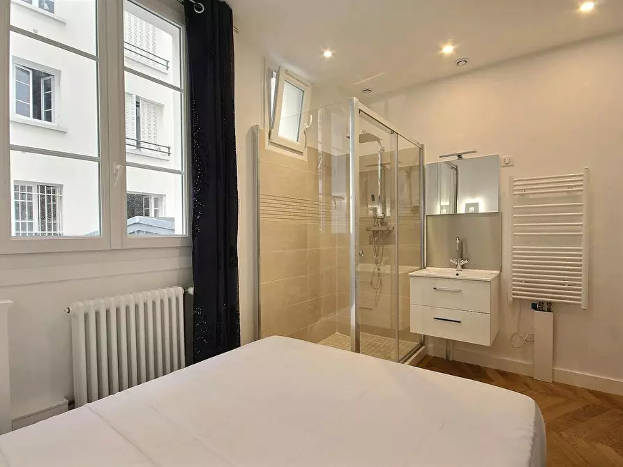 Immagine 9 di Appartamento in affitto  in Rue de Dunkerque a Paris