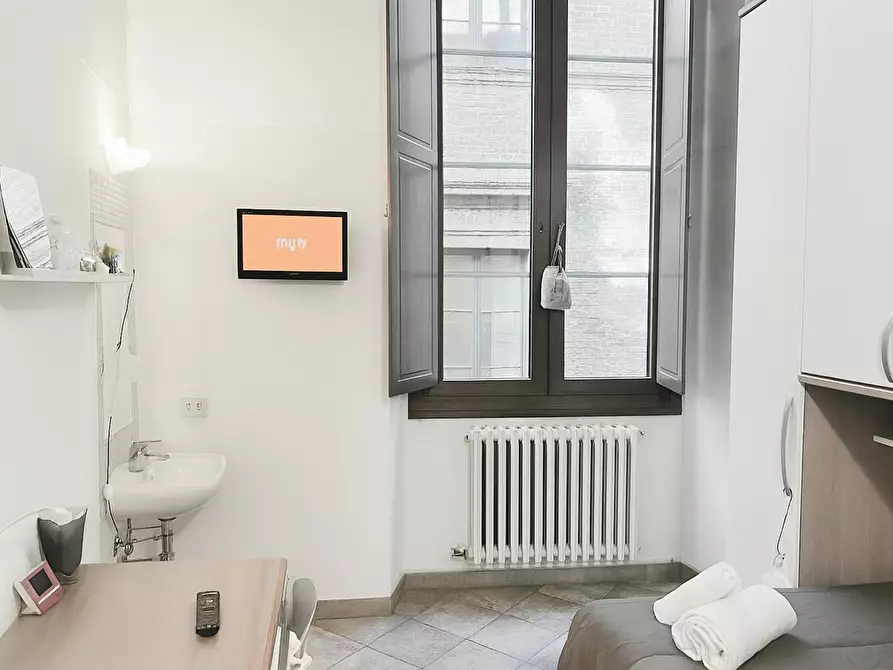 Immagine 1 di Camera condivisa in affitto  in Via del Porrione a Siena