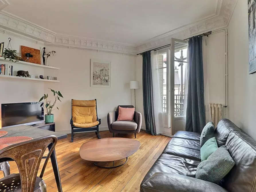 Immagine 1 di Appartamento in affitto  in Rue Duhesme a Paris 18