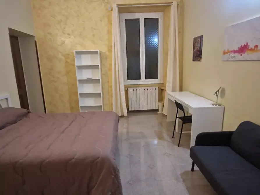 Immagine 1 di Camera in affitto  in Via Merulana a Roma