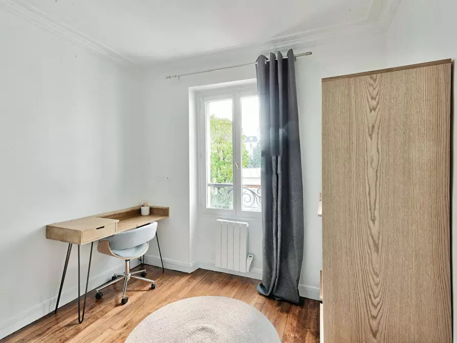 Immagine 5 di Appartamento in affitto  in Rue Ramey a Paris 18