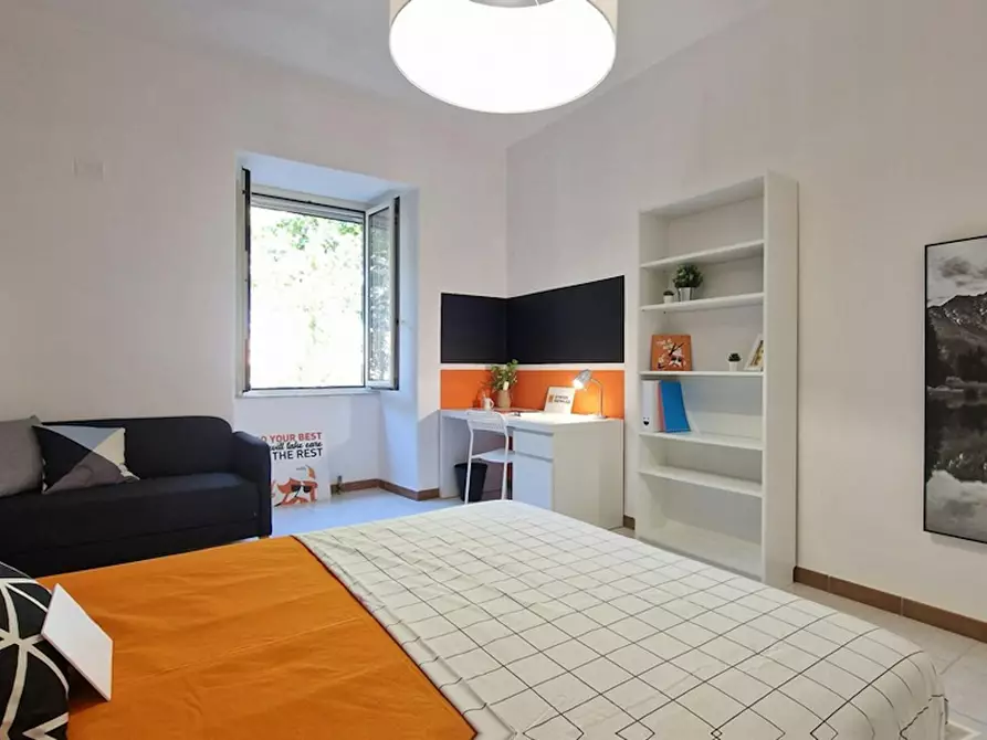 Immagine 8 di Camera in affitto  in Via Ostiense a Roma