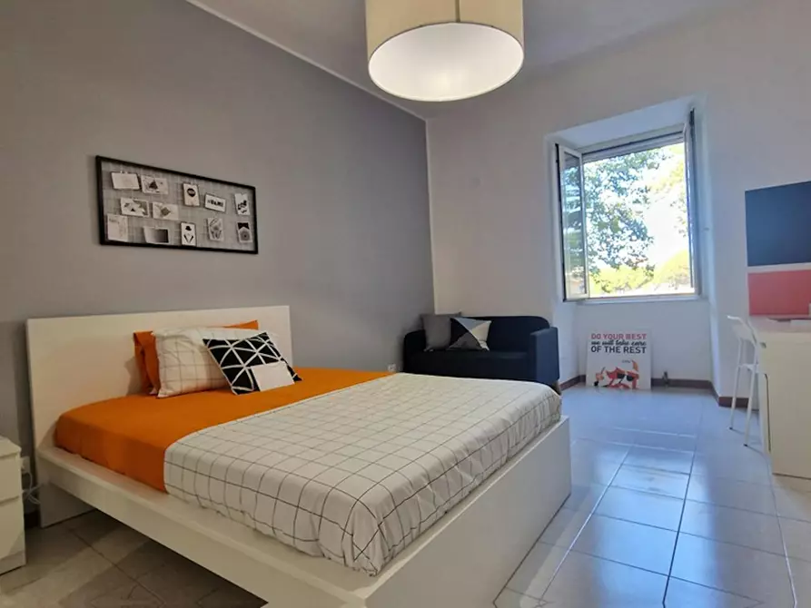 Immagine 5 di Camera in affitto  in Via Ostiense a Roma