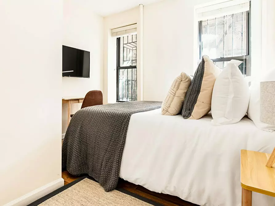 Immagine 1 di Camera in affitto  in East 93rd Street a Torino