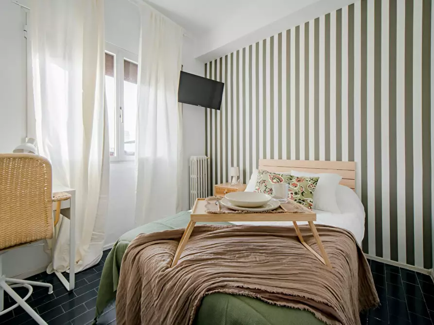 Immagine 1 di Camera in affitto  in Calle de Rodríguez Marín a Madrid