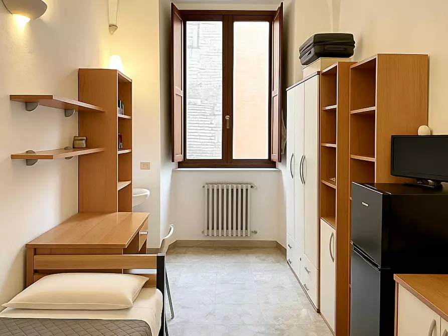 Immagine 1 di Camera in affitto  in Via del Porrione a Siena