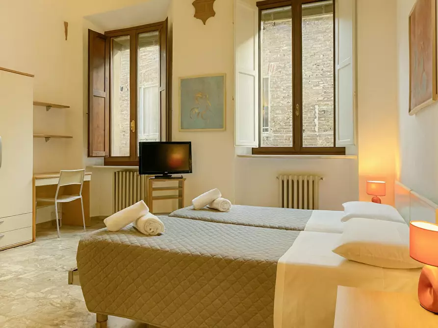 Immagine 2 di Camera condivisa in affitto  in Via del Porrione a Siena