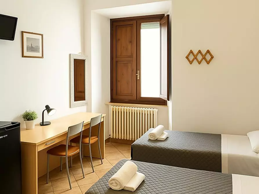 Immagine 1 di Camera condivisa in affitto  in Via del Porrione a Siena