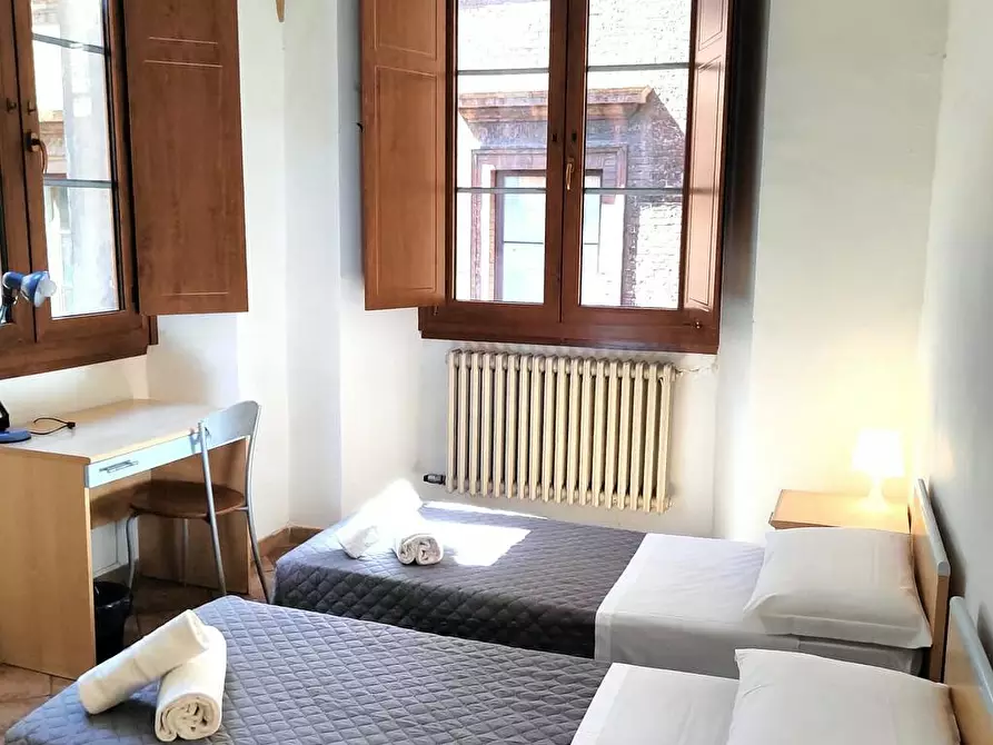 Immagine 6 di Camera condivisa in affitto  in Via del Porrione a Siena