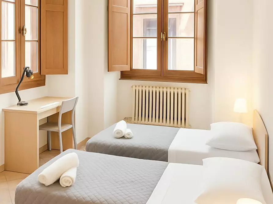 Immagine 1 di Camera condivisa in affitto  in Via del Porrione a Siena