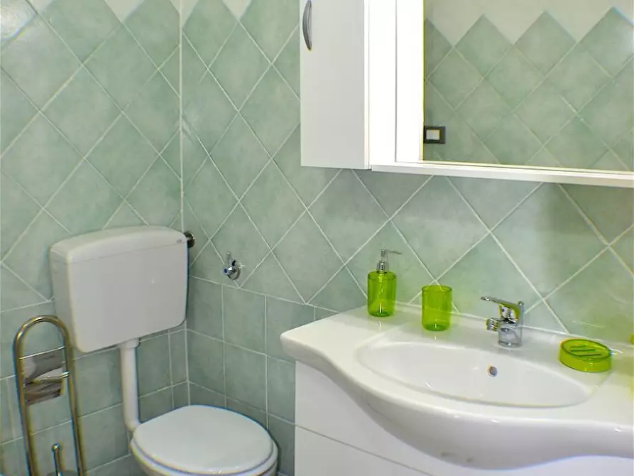 Immagine 17 di Casa vacanze in affitto  in via monti 22 a San Teodoro