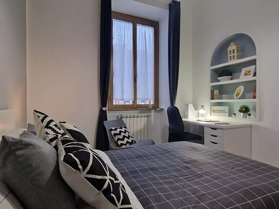 Immagine 9 di Camera in affitto  in Via Cerveteri13 a Roma