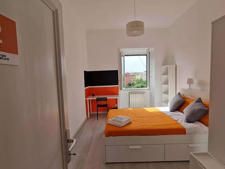 Immagine 4 di Camera in affitto  in Via Ostiense343 a Roma