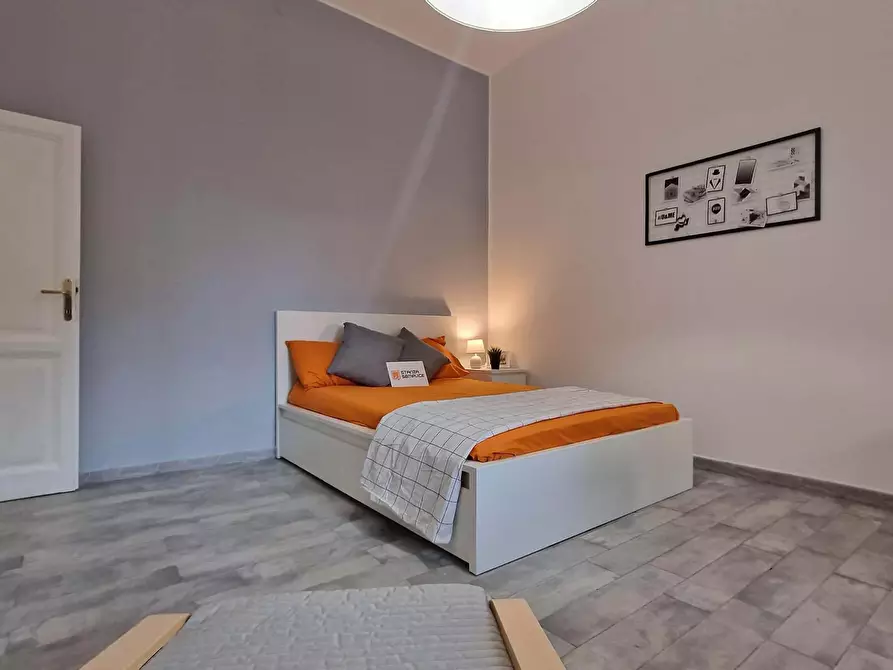 Immagine 12 di Camera in affitto  in Via Ostiense343 a Roma