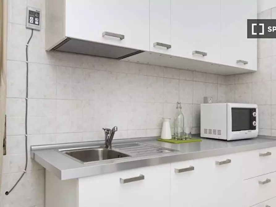 Immagine 10 di Camera condivisa in affitto  in Viale Carlo Espinasse a Milano