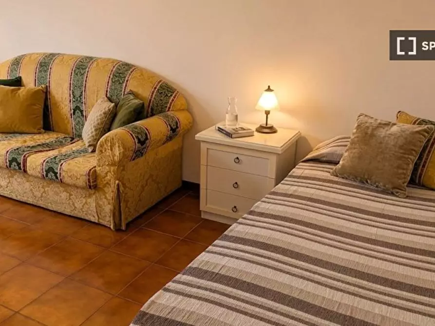 Immagine 12 di Camera condivisa in affitto  in Via Umberto Lilloni a Roma