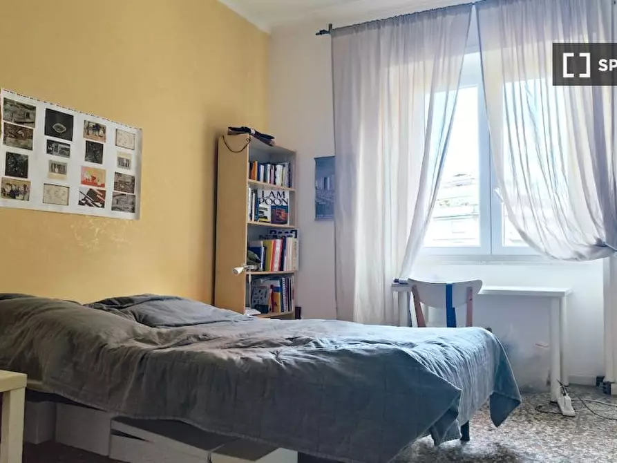 Immagine 9 di Camera condivisa in affitto  in Via Oreste Tommasini, 00162 Roma RM, Italy a Roma