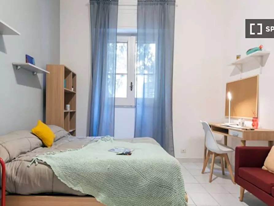 Immagine 4 di Camera condivisa in affitto  in Via Benaco a Roma