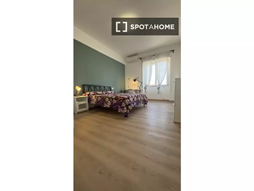 Immagine 10 di Camera condivisa in affitto  in Via Salvatore Pincherle a Roma