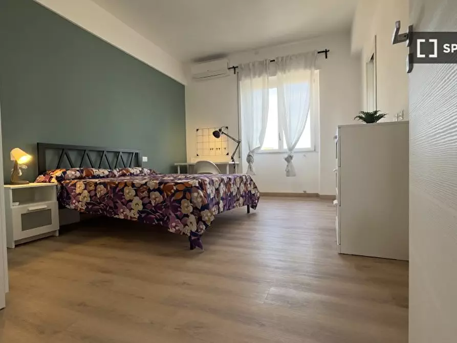Immagine 3 di Camera condivisa in affitto  in Via Salvatore Pincherle a Roma