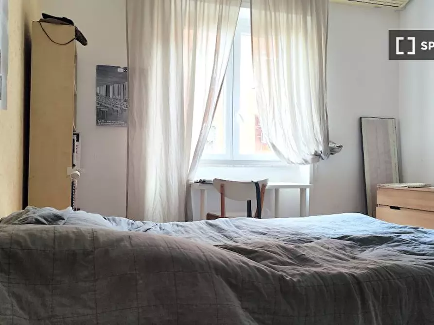 Immagine 2 di Camera condivisa in affitto  in Via Oreste Tommasini, 00162 Roma RM, Italy a Roma