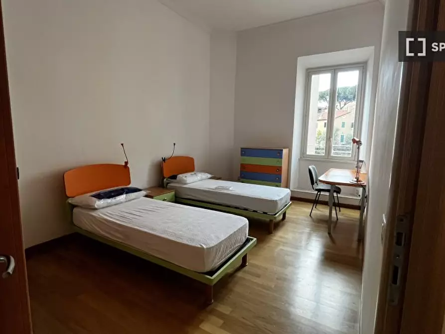 Immagine 1 di Camera condivisa in affitto  in Via Della Collina Volpi a Roma