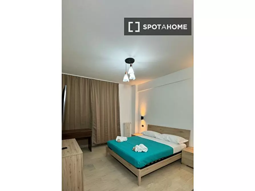 Immagine 17 di Camera condivisa in affitto  in Via Damaso Cerquetti a Roma