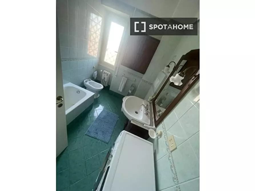 Immagine 4 di Camera condivisa in affitto  in Via Vacuna a Roma