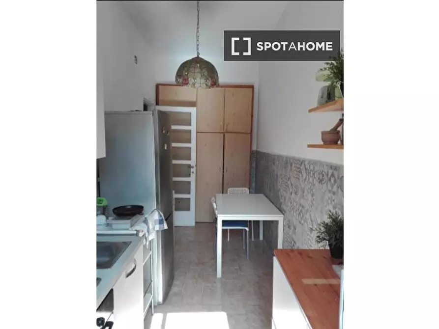 Immagine 9 di Camera condivisa in affitto  in Via Camilla a Roma