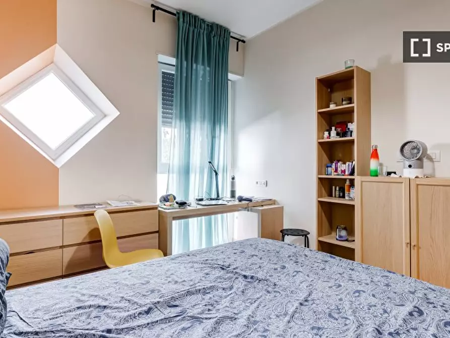 Immagine 3 di Camera condivisa in affitto  in Via Ostiense a Roma