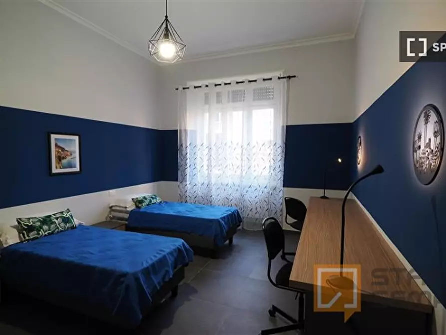 Immagine 2 di Camera condivisa in affitto  in Corso Peschiera a Torino