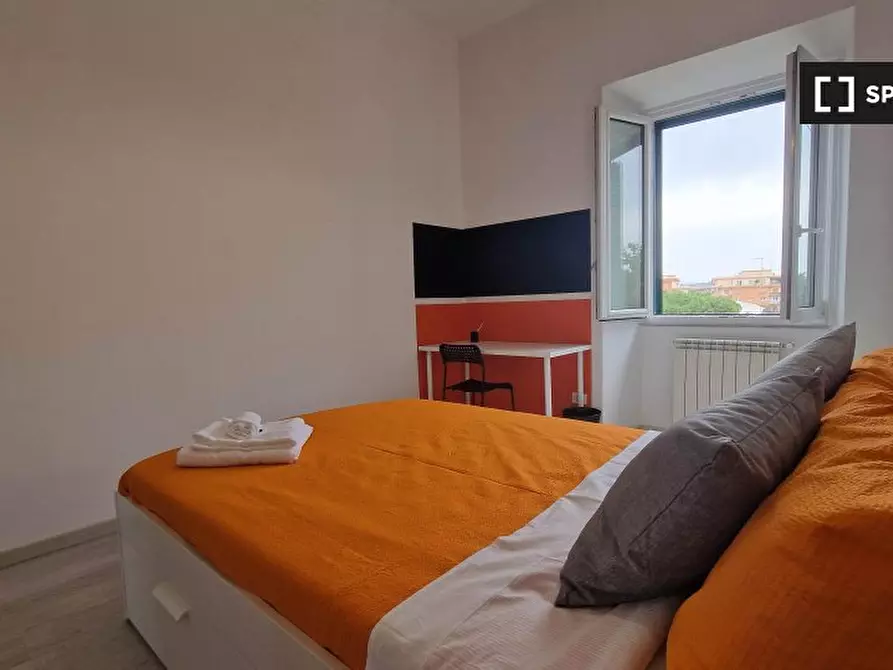Immagine 11 di Camera condivisa in affitto  in Via Ostiense a Roma