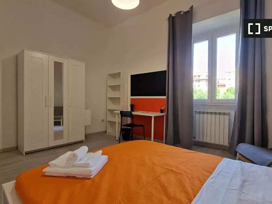 Immagine 17 di Camera condivisa in affitto  in Via Ostiense a Roma