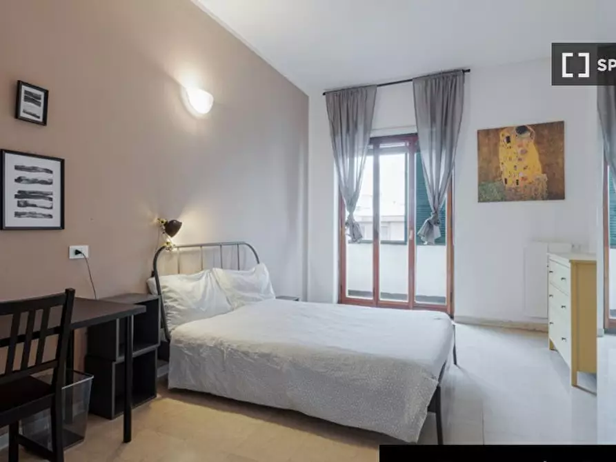 Immagine 2 di Camera condivisa in affitto  in Via Curtatone a Milano