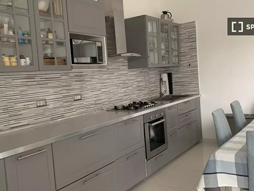 Immagine 11 di Camera condivisa in affitto  in Via Pavese a Rozzano