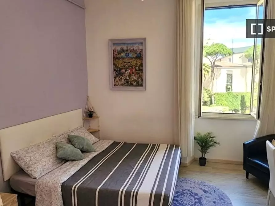 Immagine 1 di Camera condivisa in affitto  in Via Portoferraio a Roma