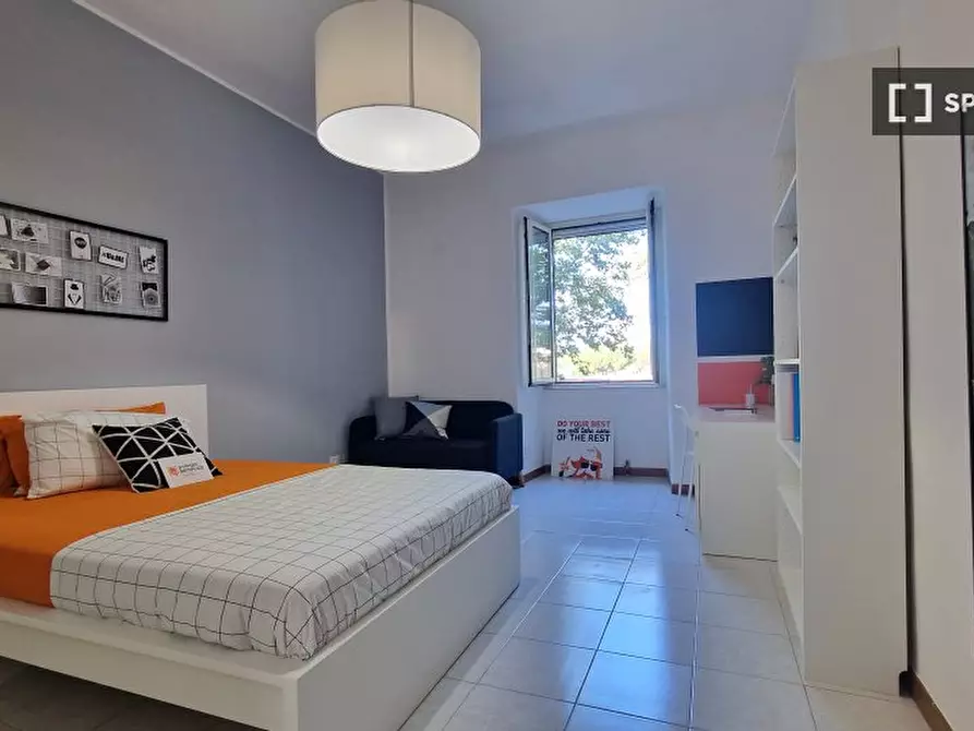 Immagine 2 di Camera condivisa in affitto  in Via Ostiense a Roma