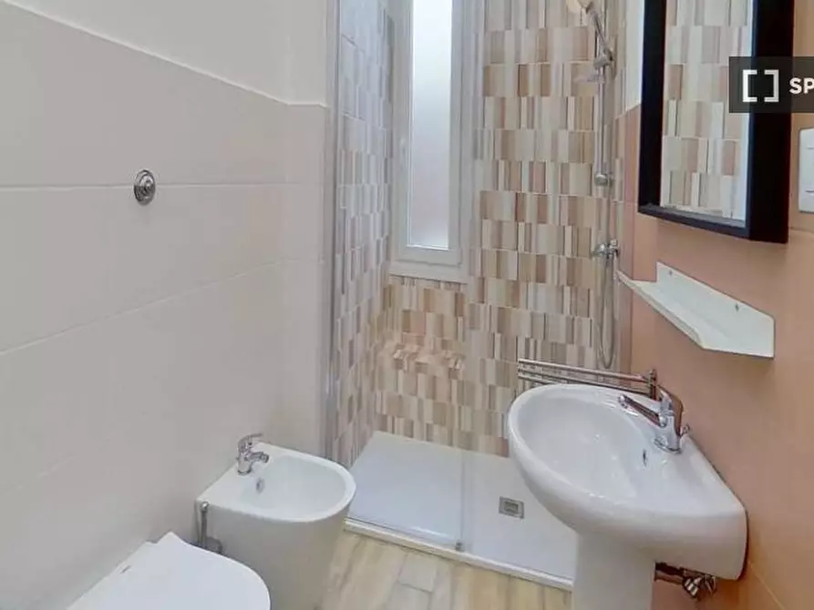 Immagine 10 di Camera condivisa in affitto  in Via Gualtiero Castellini a Roma