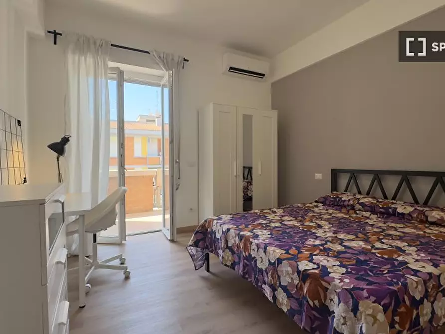 Immagine 7 di Camera condivisa in affitto  in Via Salvatore Pincherle a Roma