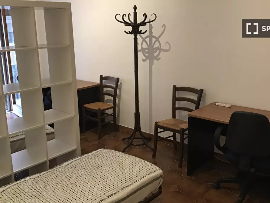 Immagine 1 di Camera condivisa in affitto  in Via Renato Simoni a Roma